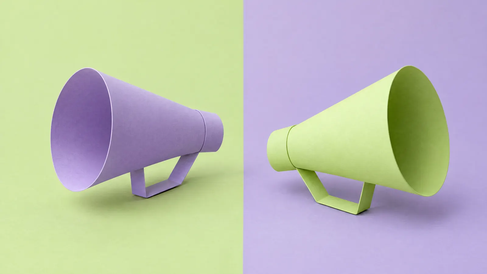 Lilac and lime paper megaphones facing opposite ways on a split backdrop, comparing Google Ads vs Meta Ads for leads